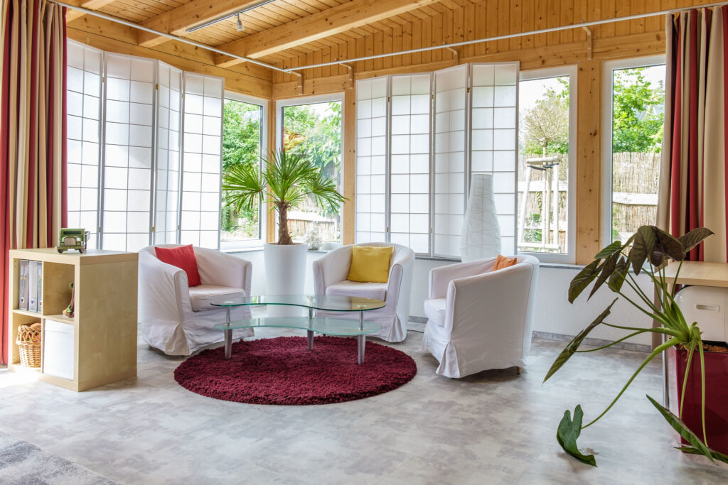 Konferenzraum mit gemütlicher Lounge im Wintergarten